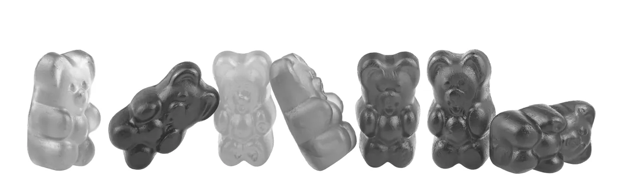 Foto van een rij gummibeertjes.