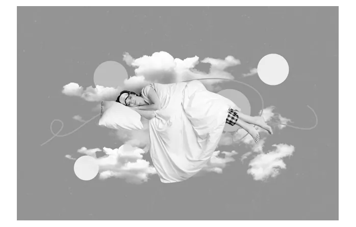 Zwart-witcollage van een slapende vrouw die op een kussen en laken tussen wolken en cirkels zweeft.